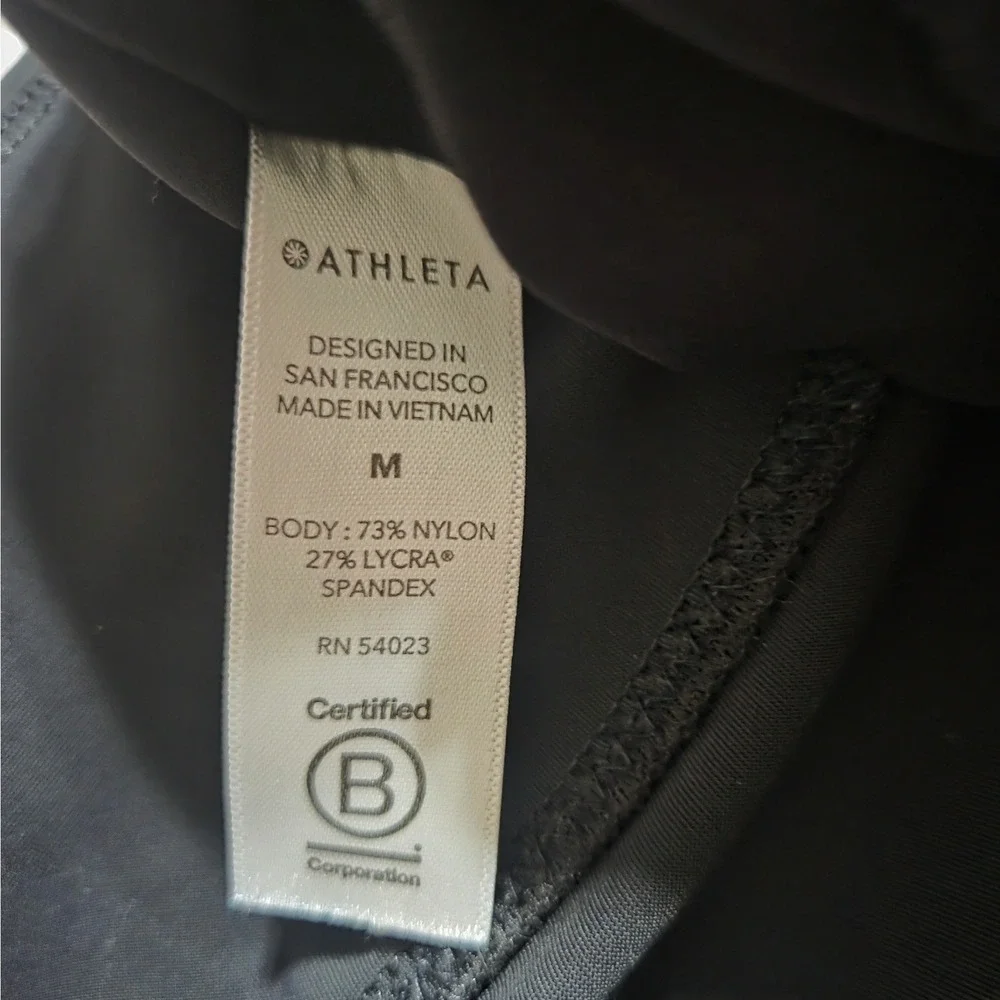 Athleta Stellar Tight Black High Rise Zipper Pocket Leggings Womens Size M - Picture 4 of 4